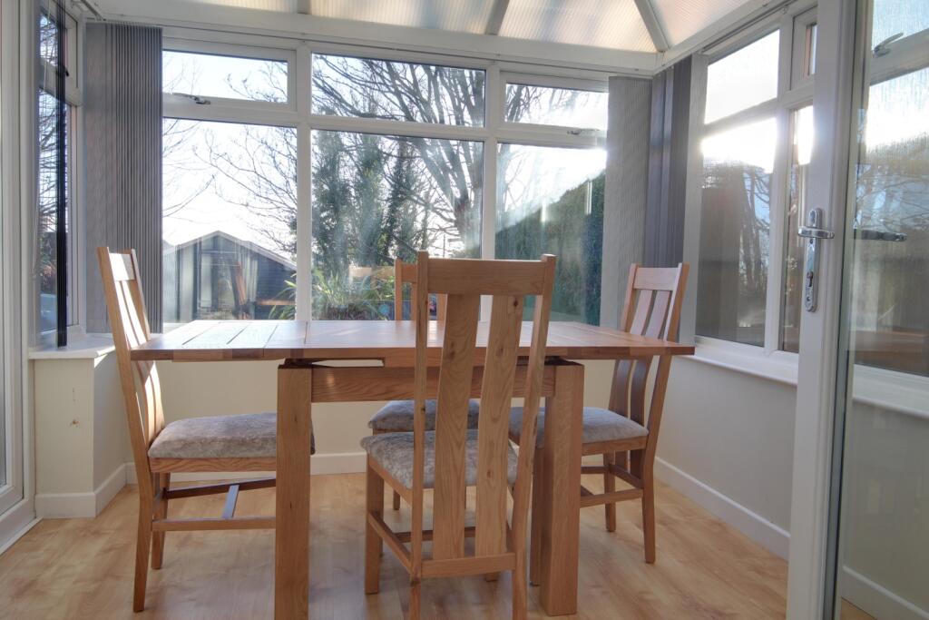 Conservatory overlooking the back garden