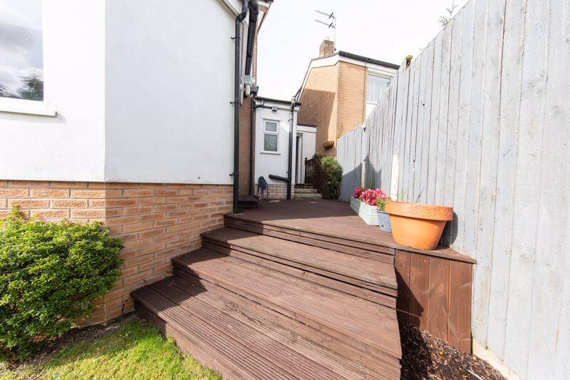 Decked patio and steps to garden