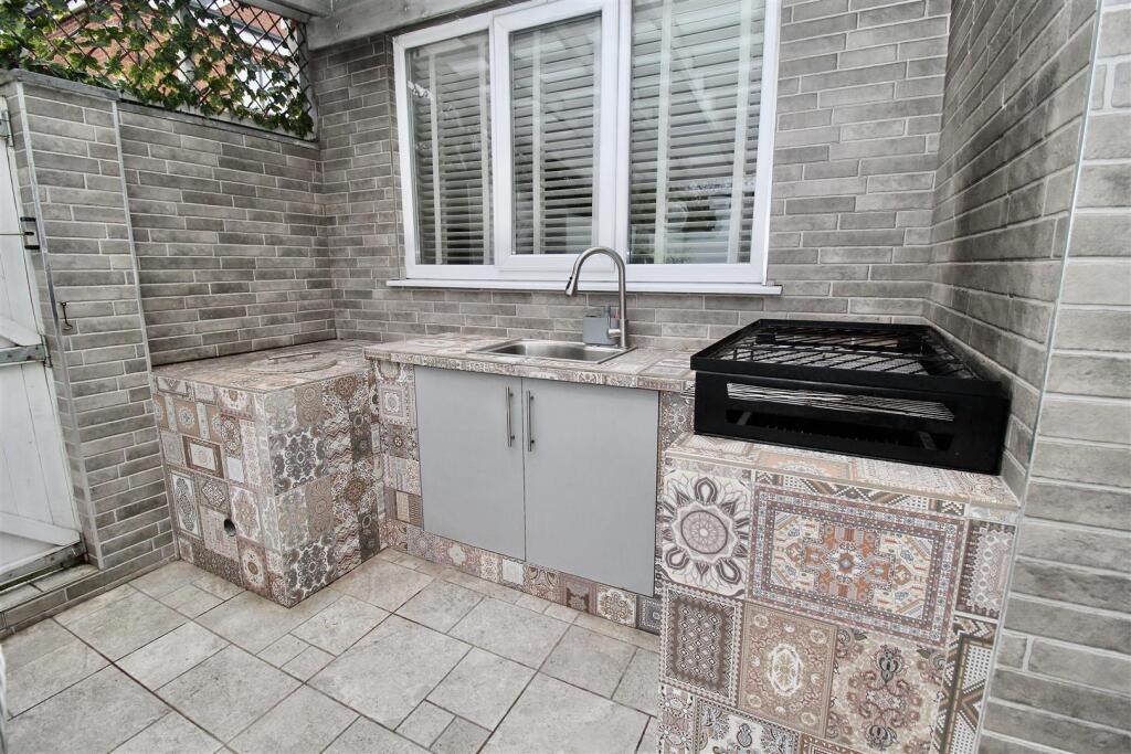 Covered Seating Area/ Outside Kitchen