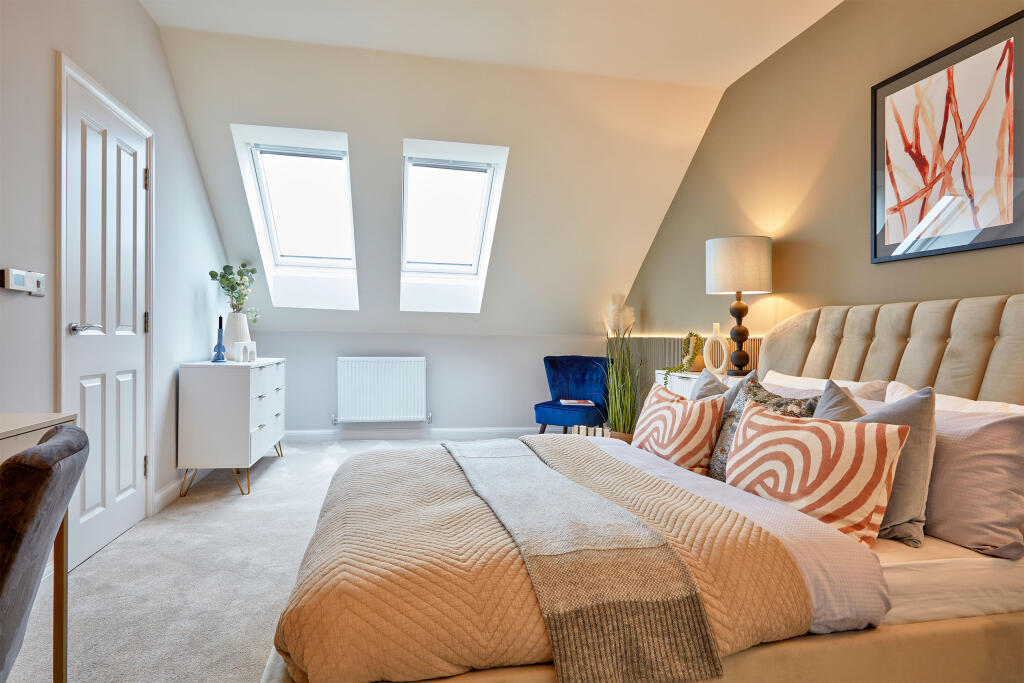 En suite main bedroom in the Woodcote 4 bedroom home