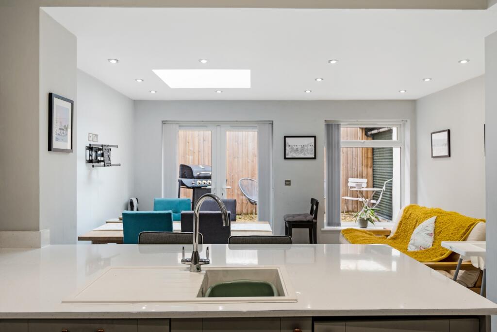 Kitchen to dining and courtyard garden