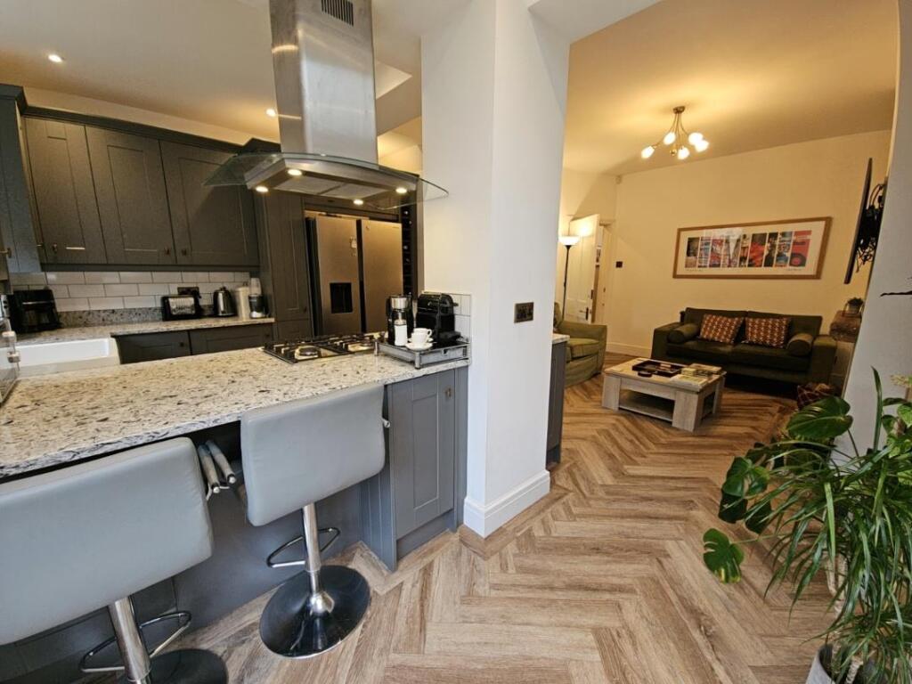 Dining Area to Kitchen