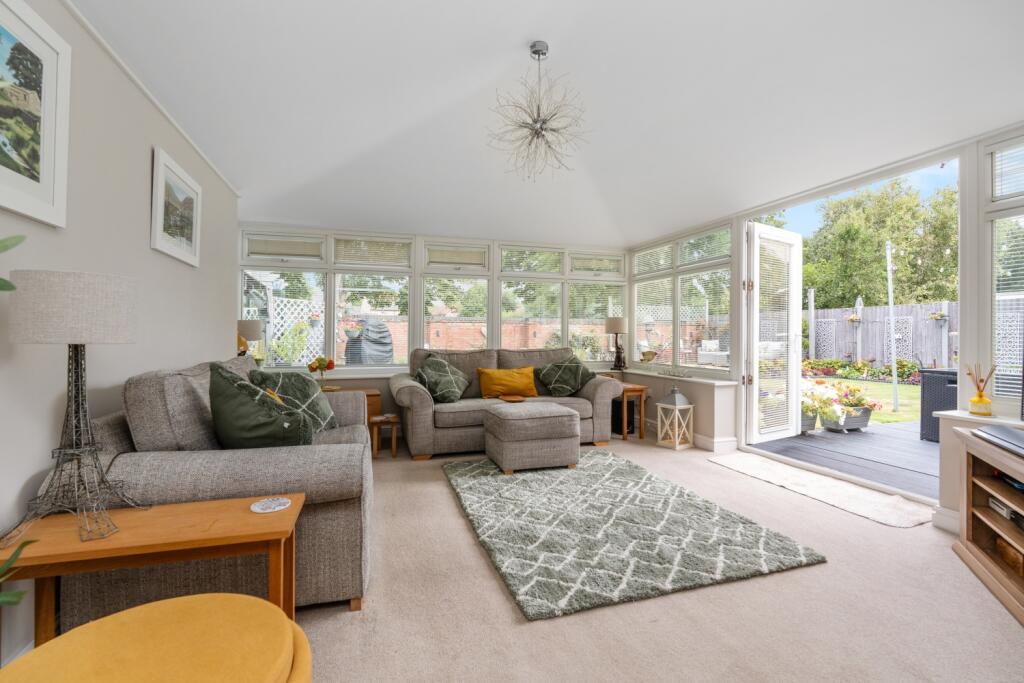 Family room with doors leading to the garden