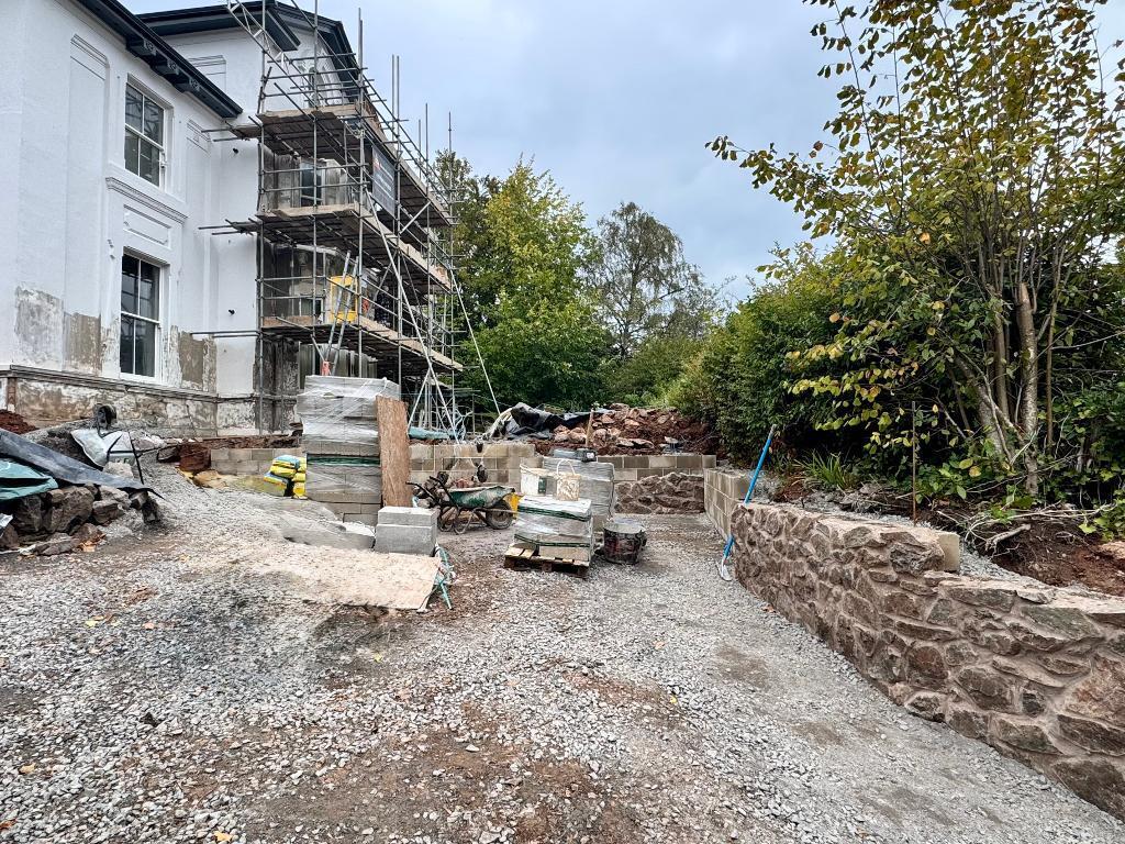 New parking area with Malvern stone wall