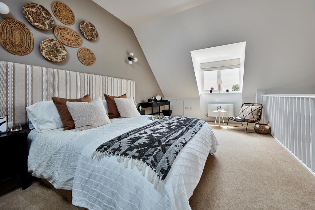 Bedroom 1 occupies the whole top floor, creating a private and peaceful area