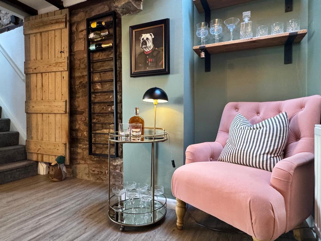 Shows wooden door and stone work