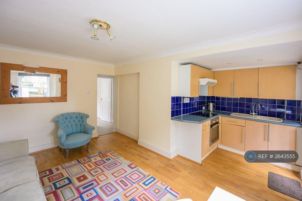 Open Plan Sitting Room With Kitchen