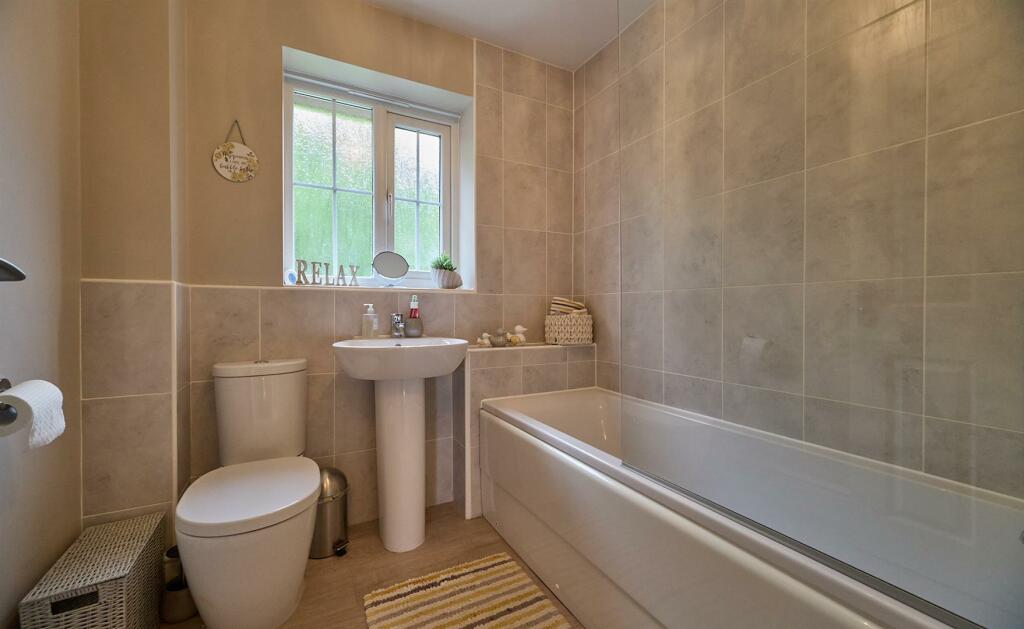 Family bathroom to rear