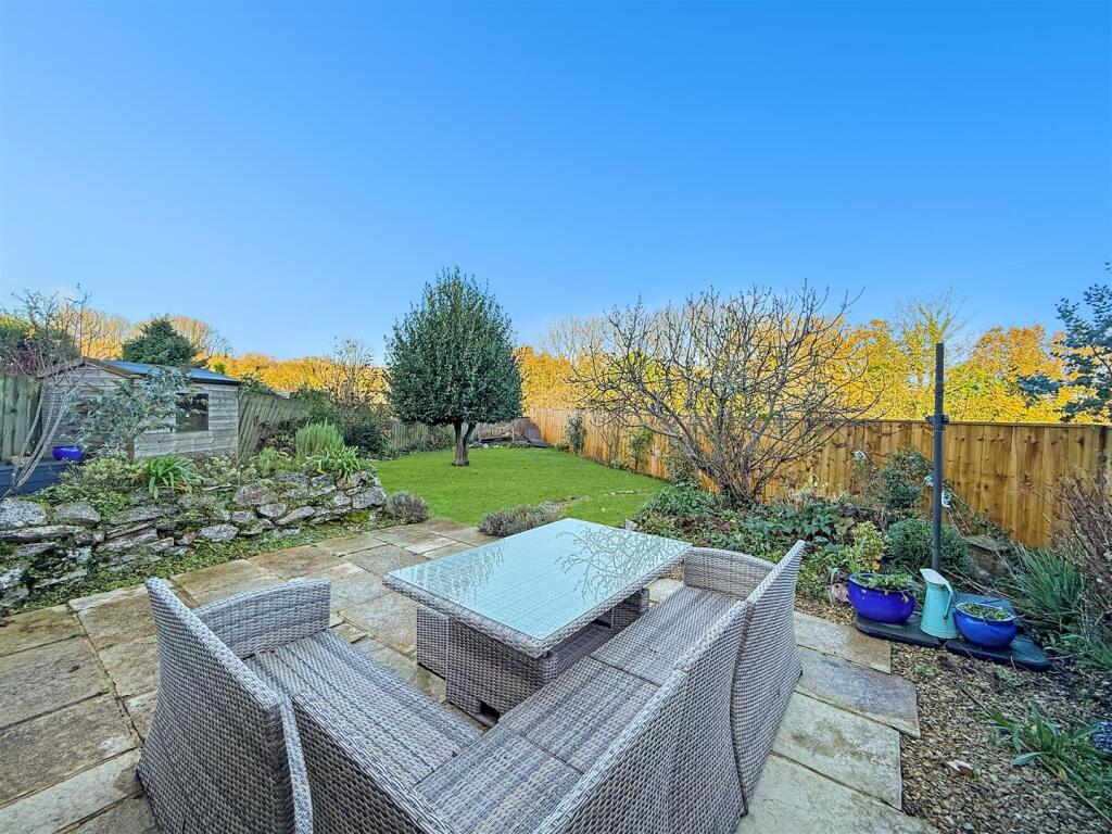 Patio Seating Area Into Gardens.JPG