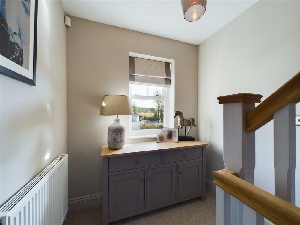 FIRST FLOOR LANDING