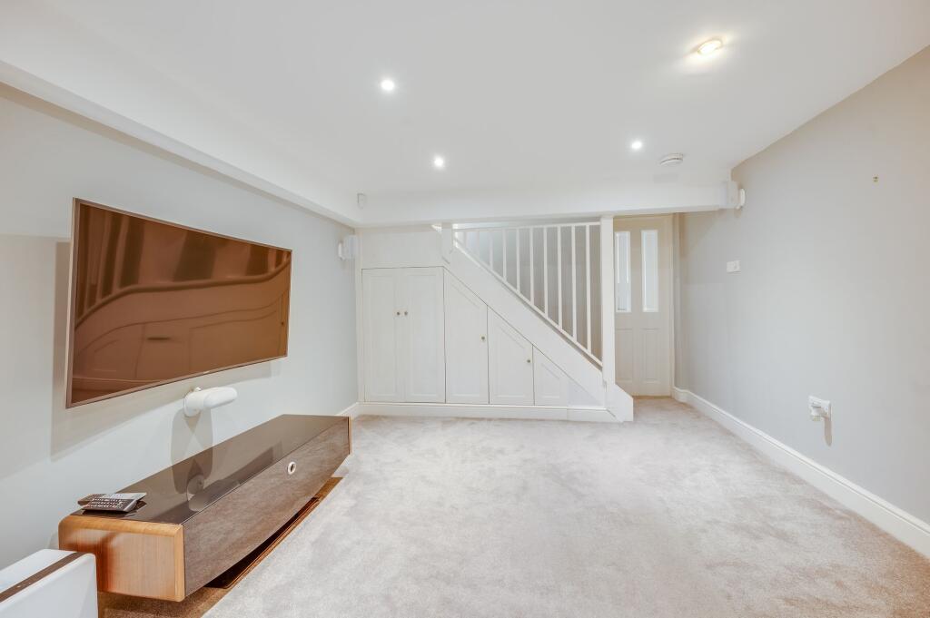 CONVERTED BASEMENT LIVING/CINEMA ROOM