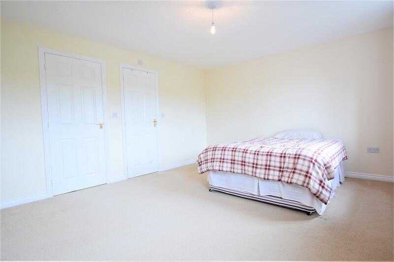 Master bedroom with en-suite shower room