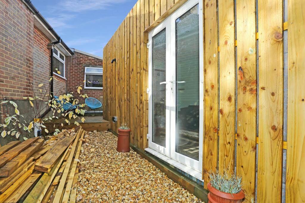 Outbuilding &amp; Decked Area