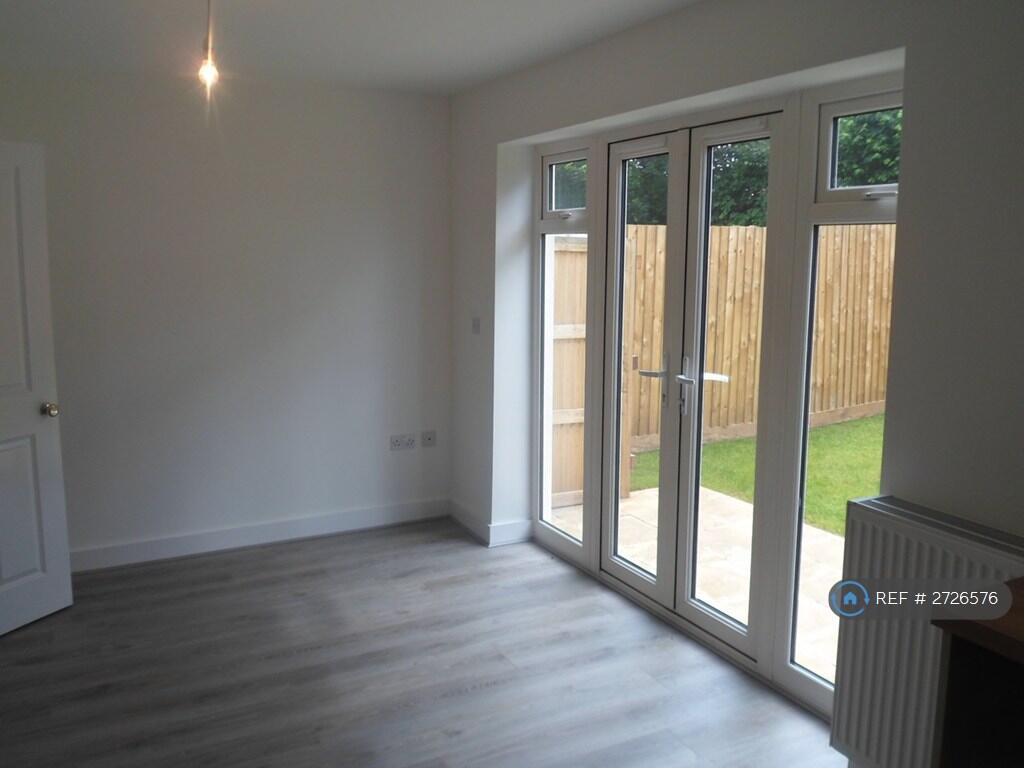 French Doors Leading To Enclosed Paved Garden 