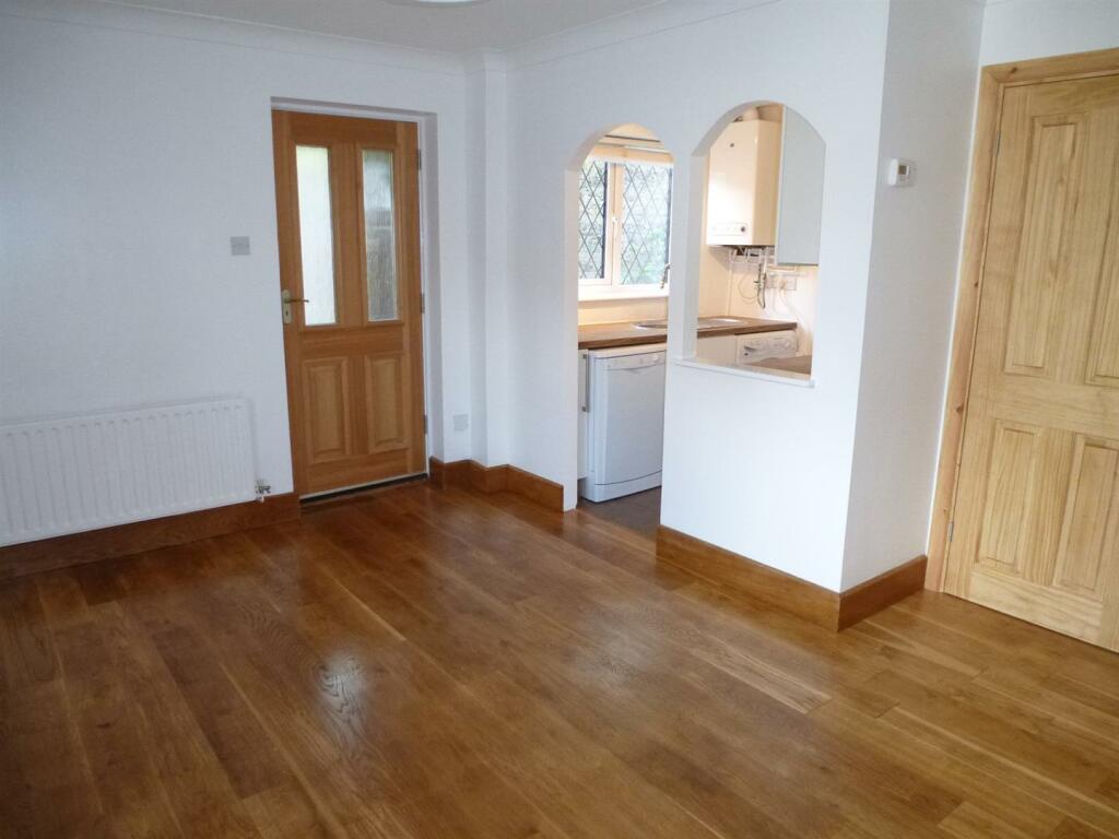 29 Mill Close sitting room and kitchen.jpg