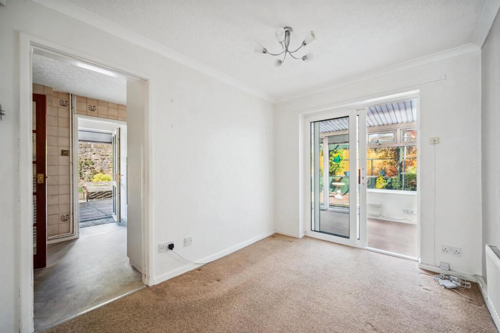 Dining Room towards kitchen and conservatory.jpg