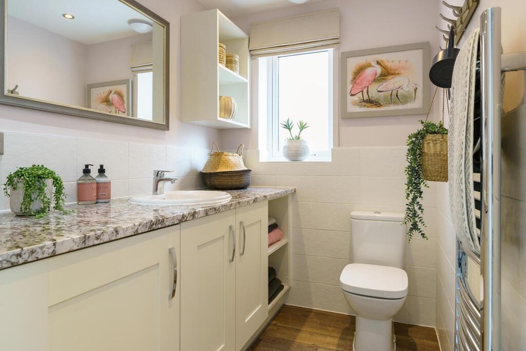 Handy cloakroom and utility room with laundry space