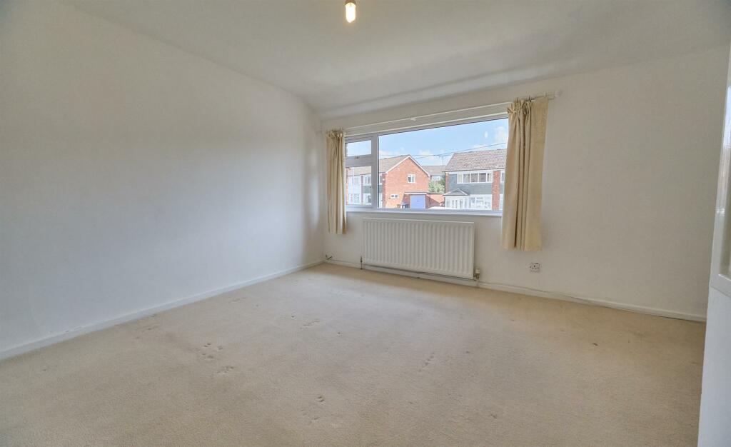 FRONT BEDROOM ONE