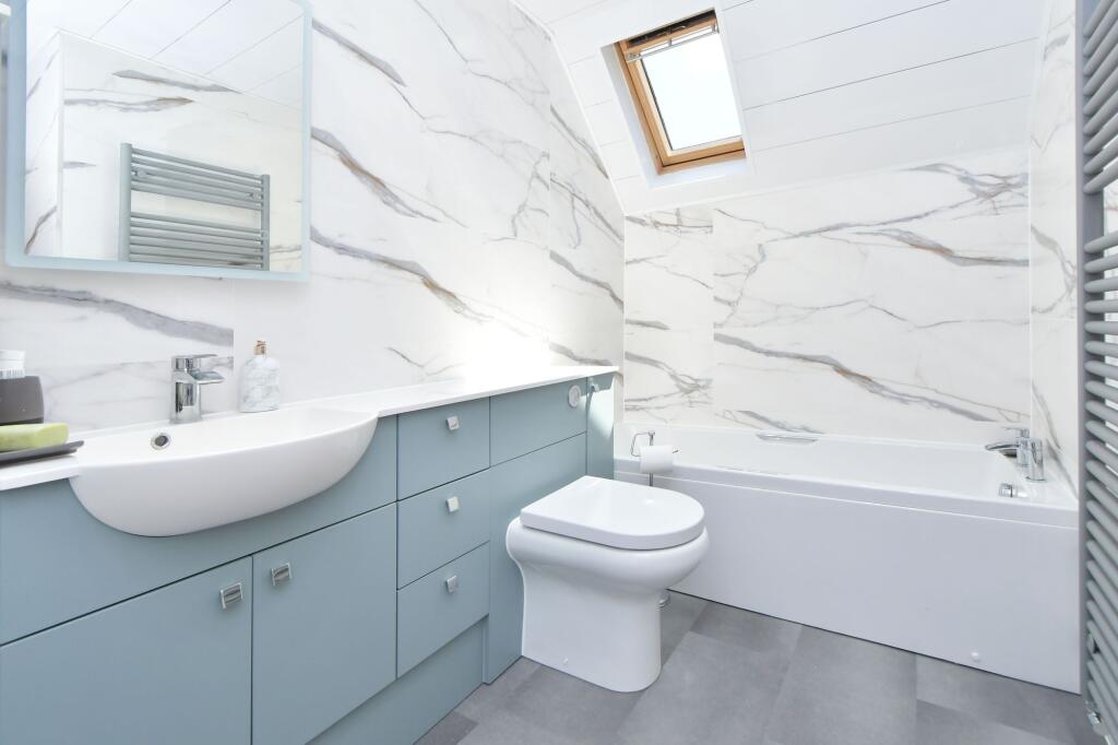 fitted with a bath and separate shower enclosure