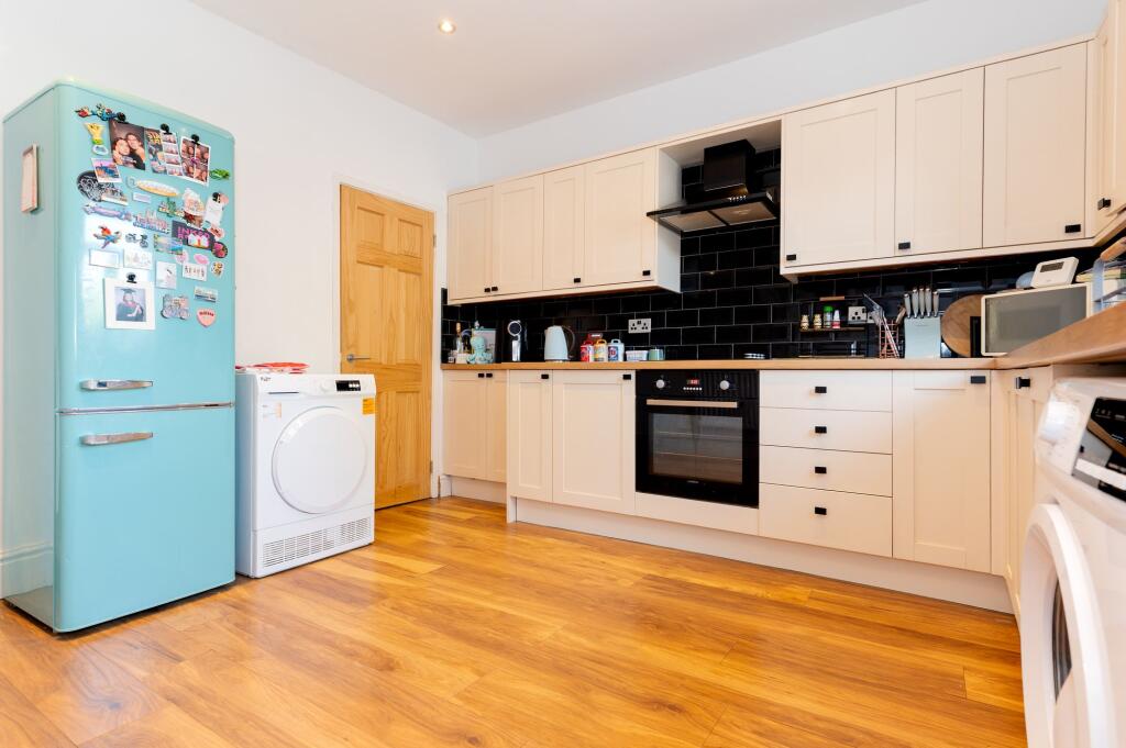 KITCHEN/DINER AND LIVING ROOM