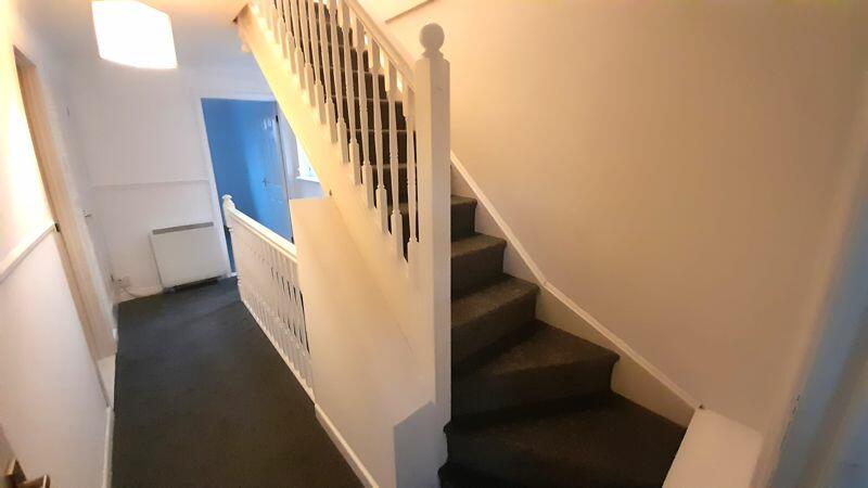 Landing with stairs to Attic
