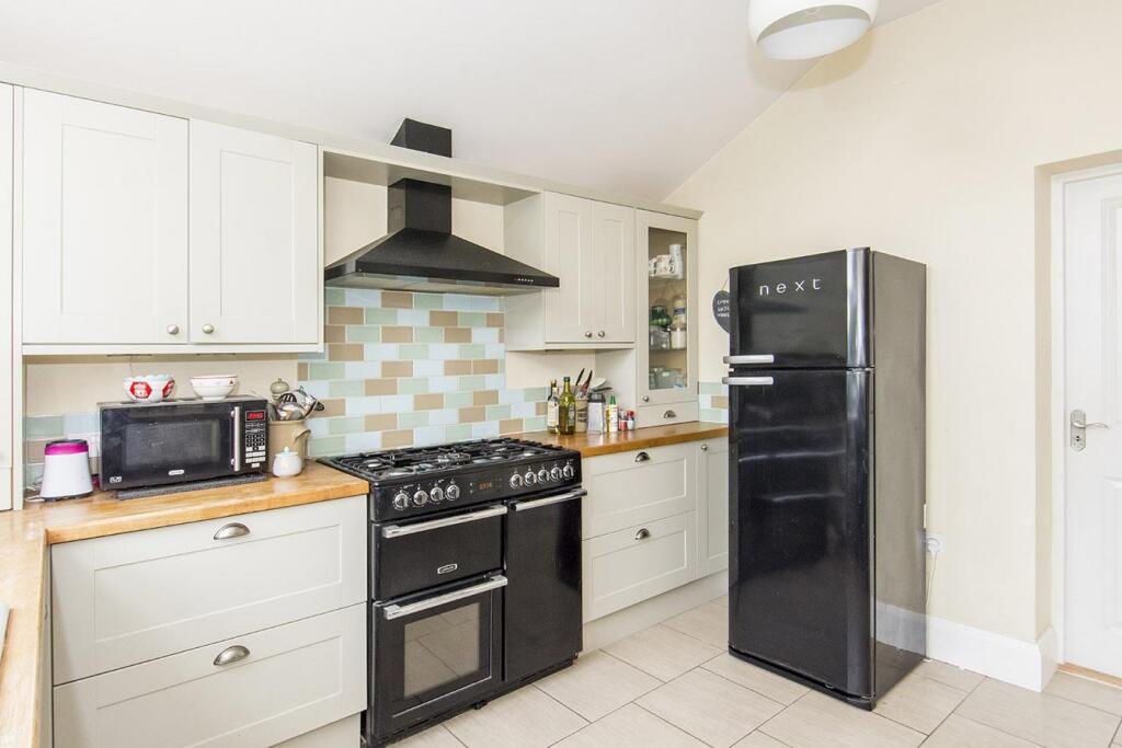 (Kitchen Area Photo Four)