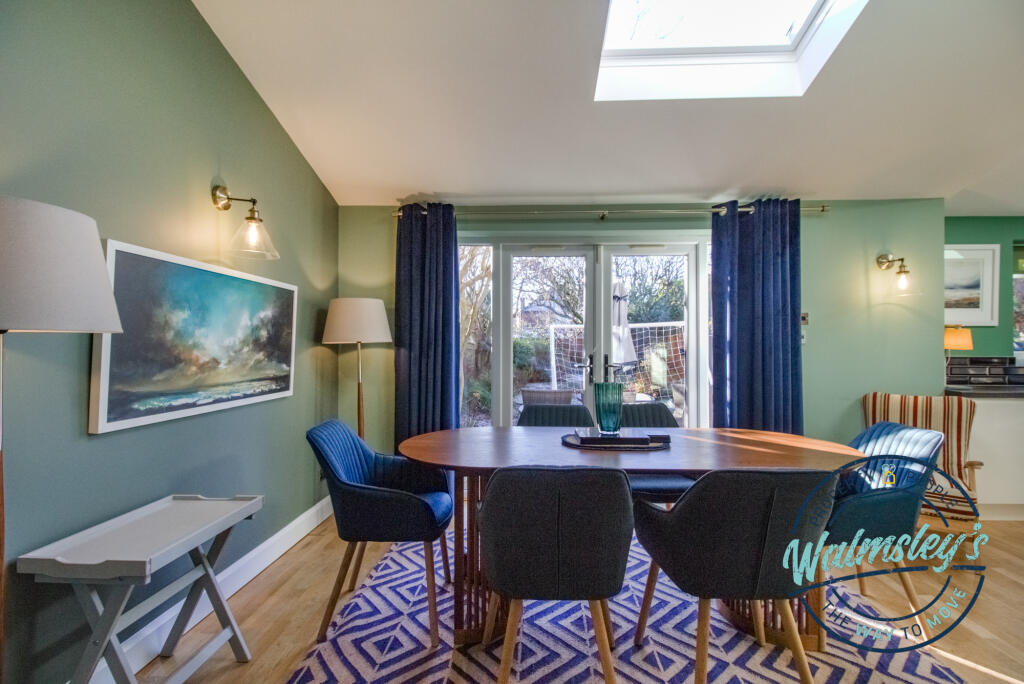Dining area with French doors to gardens &amp; skyligh