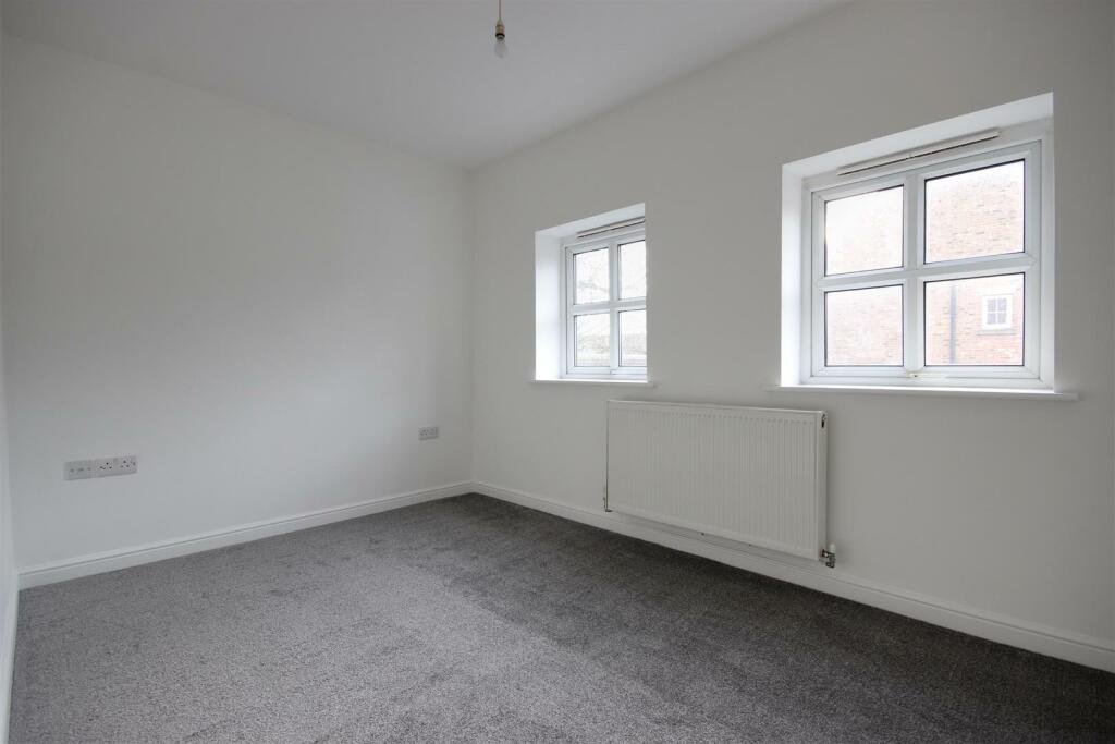 BEDROOM 1 (REAR)