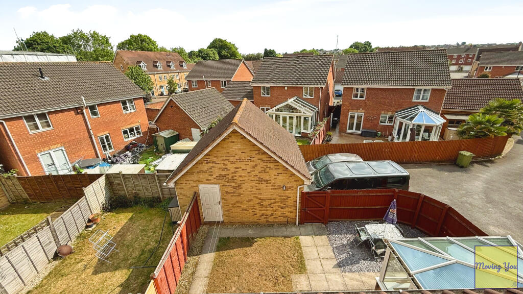 View of garage &amp; garden