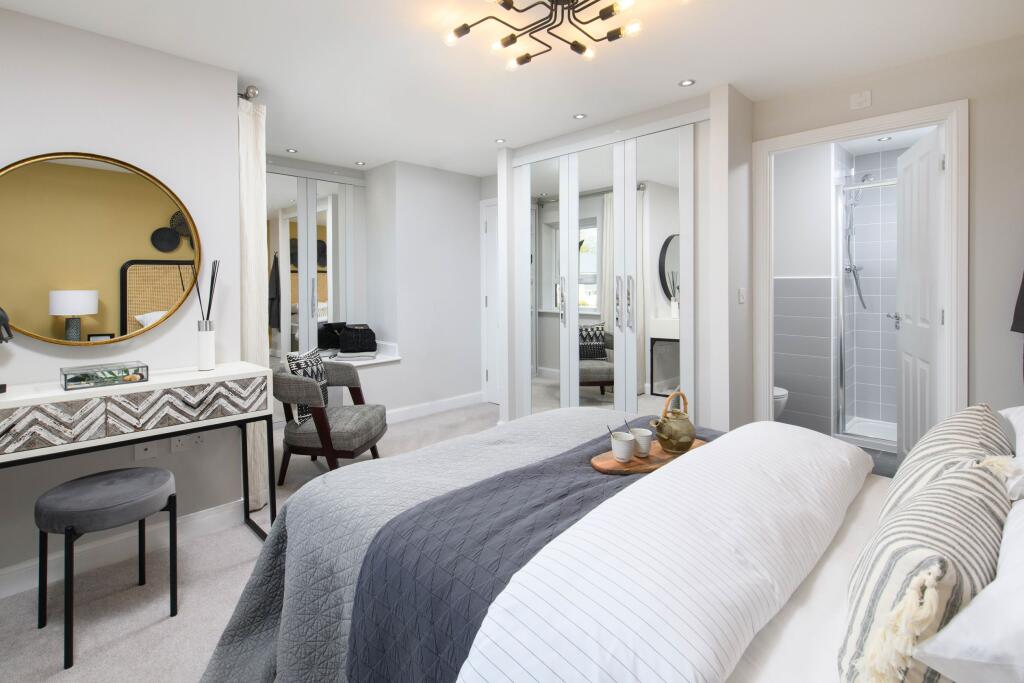 Main bedroom with en-suite &amp; built-in storage in Millford style home