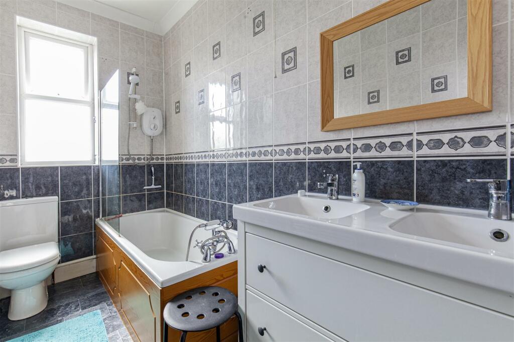 Fully Tiled Family Bathroom