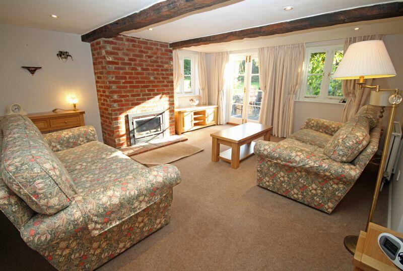 Sitting room with doors to garden