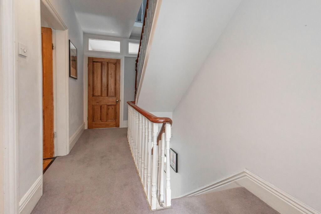 ENTRANCE HALLWAY AND LANDINGS