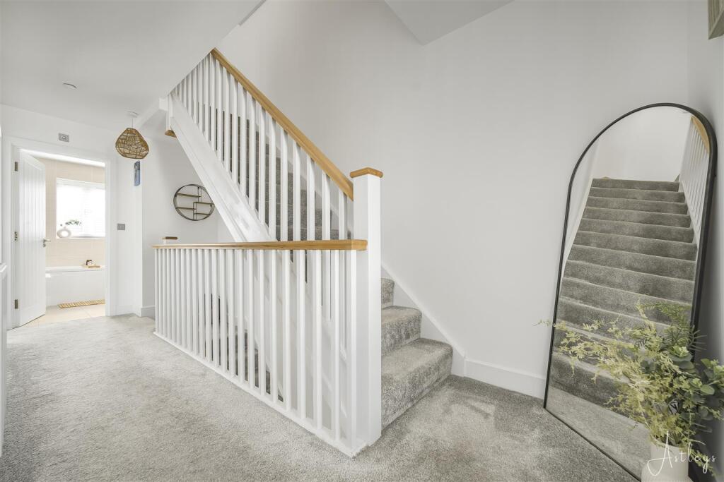 Landing to first floor