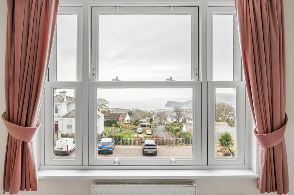 Bedroom one with views out to sea