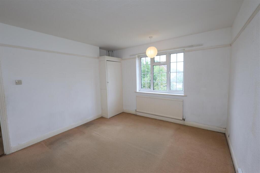 SECOND BEDROOM