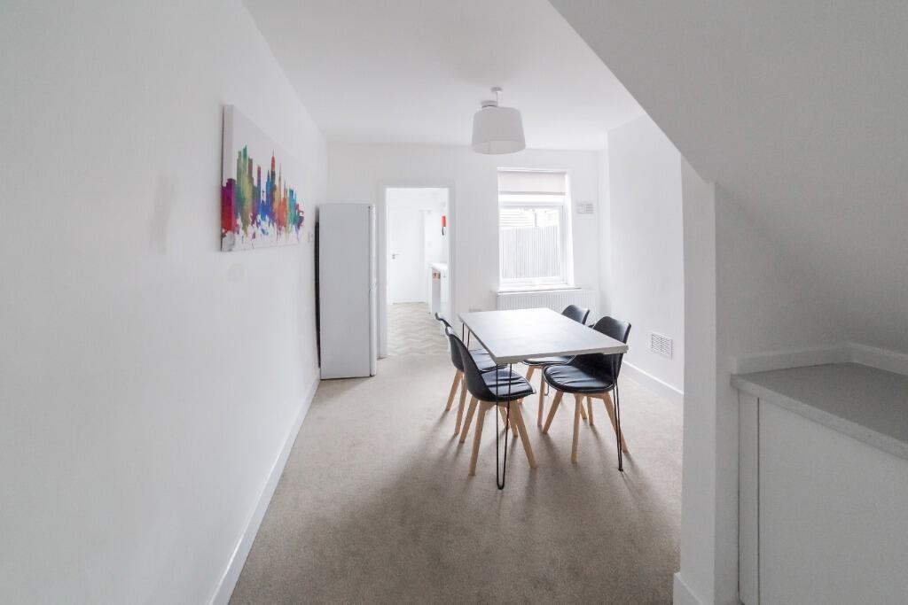 A bright and inviting communal lounge featuring...