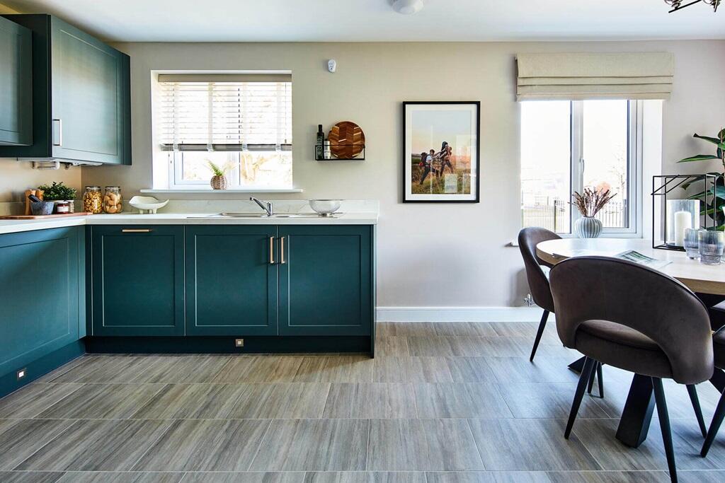 The sociable kitchen/diner is perfect for entertaining - typical Taylor Wimpey home
