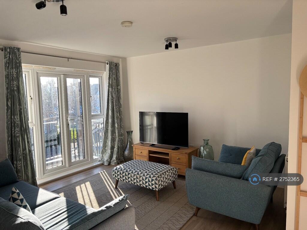 Living Room With Balcony Access