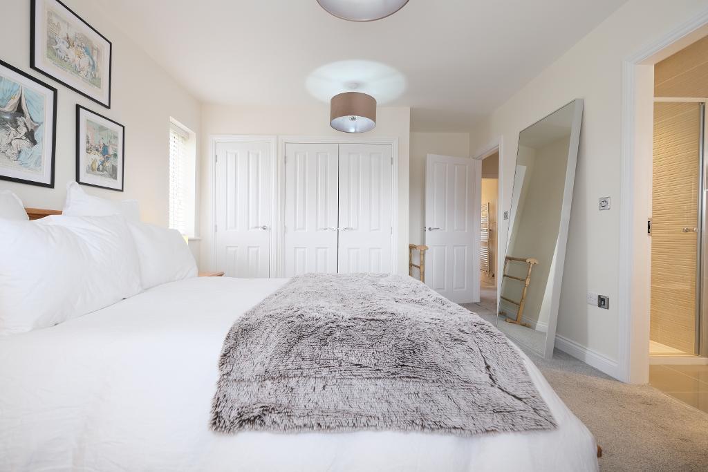 Main bedroom with fitted wardrobes