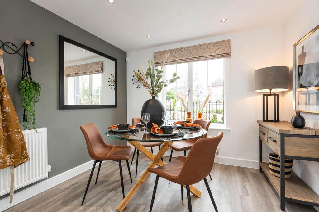 An open plan kitchen and dining area offers the perfect space for entertaining