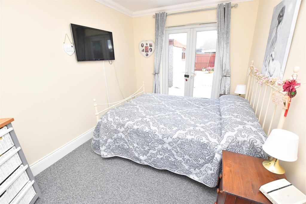 BEDROOM ONE/DINIG ROOM