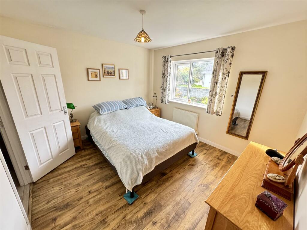 REAR MASTER BEDROOM