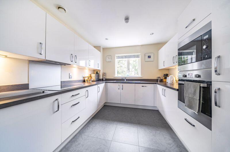 Kitchen with built-in appliances