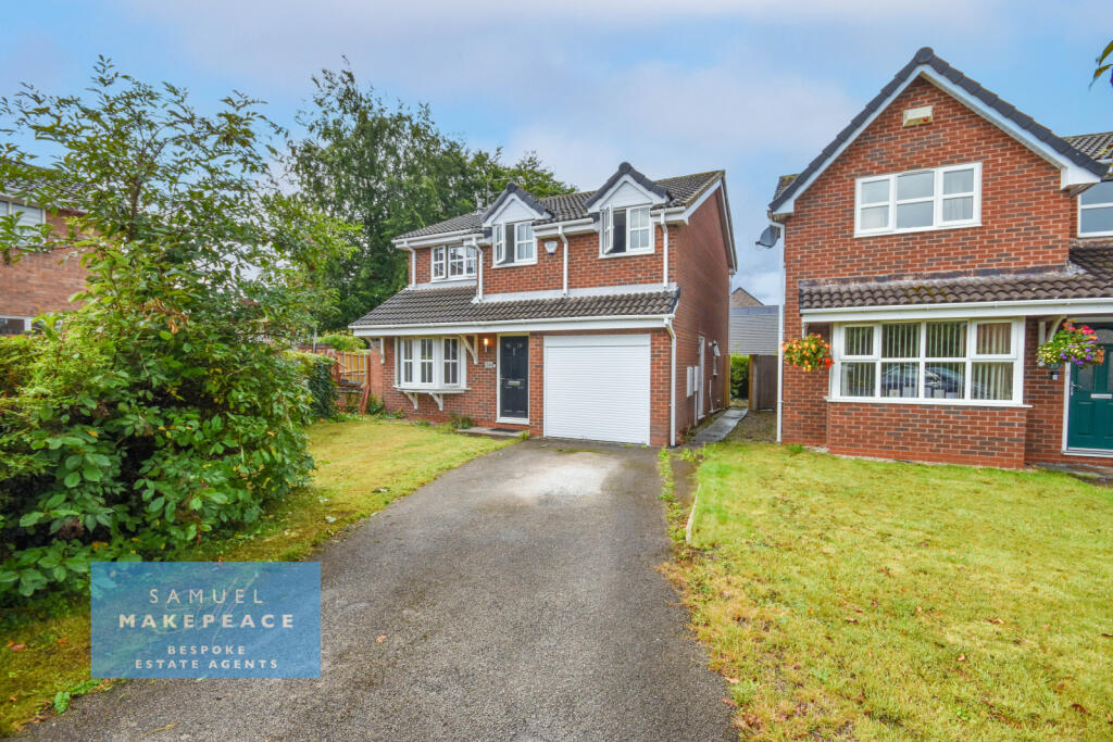 Four bed detached house with large rear garden
