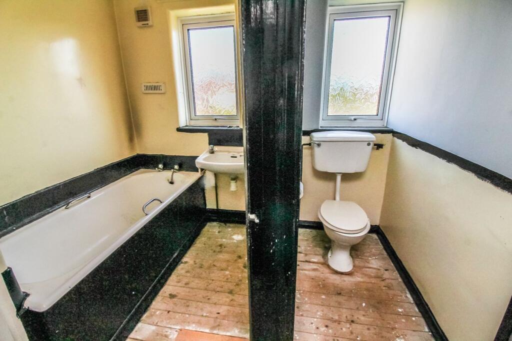 Bathroom + Separate W/C.