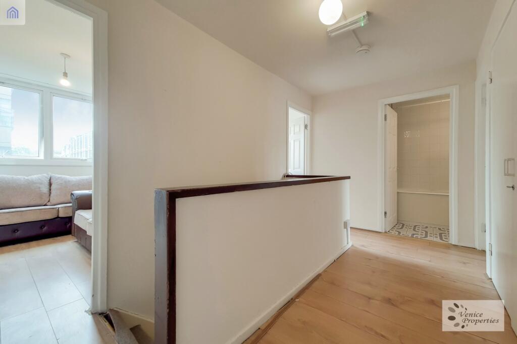 Bright and spacious bathroom with a large batht...
