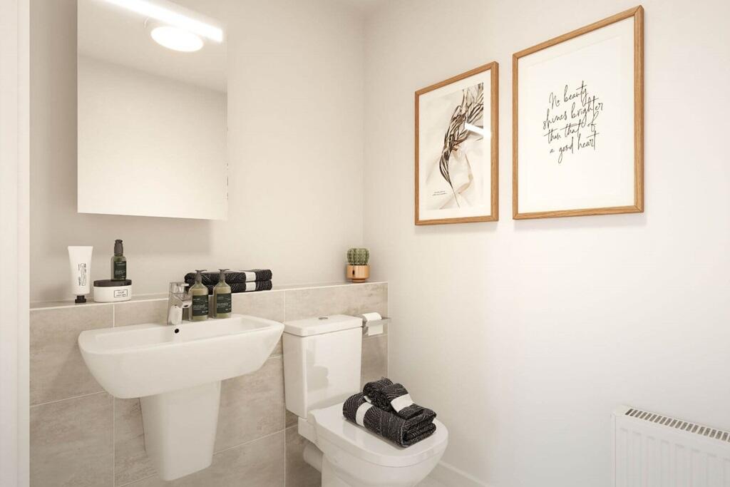 A convenient WC is located downstairs
