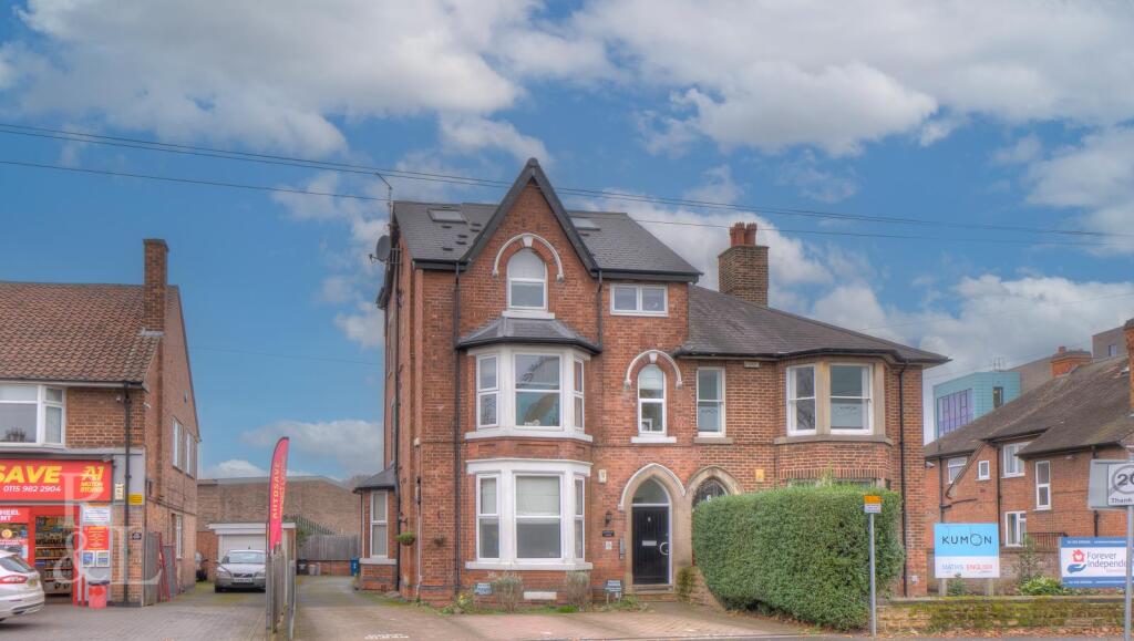 3 apartments at front with side access to Town Hou
