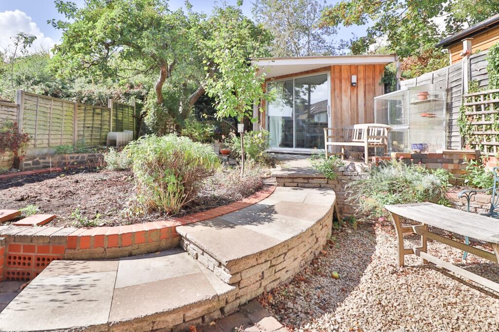Rear Garden with large apple tree and presently us